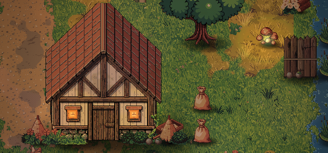 A timber-framed cottage with a red tiled roof beside a river, by day.